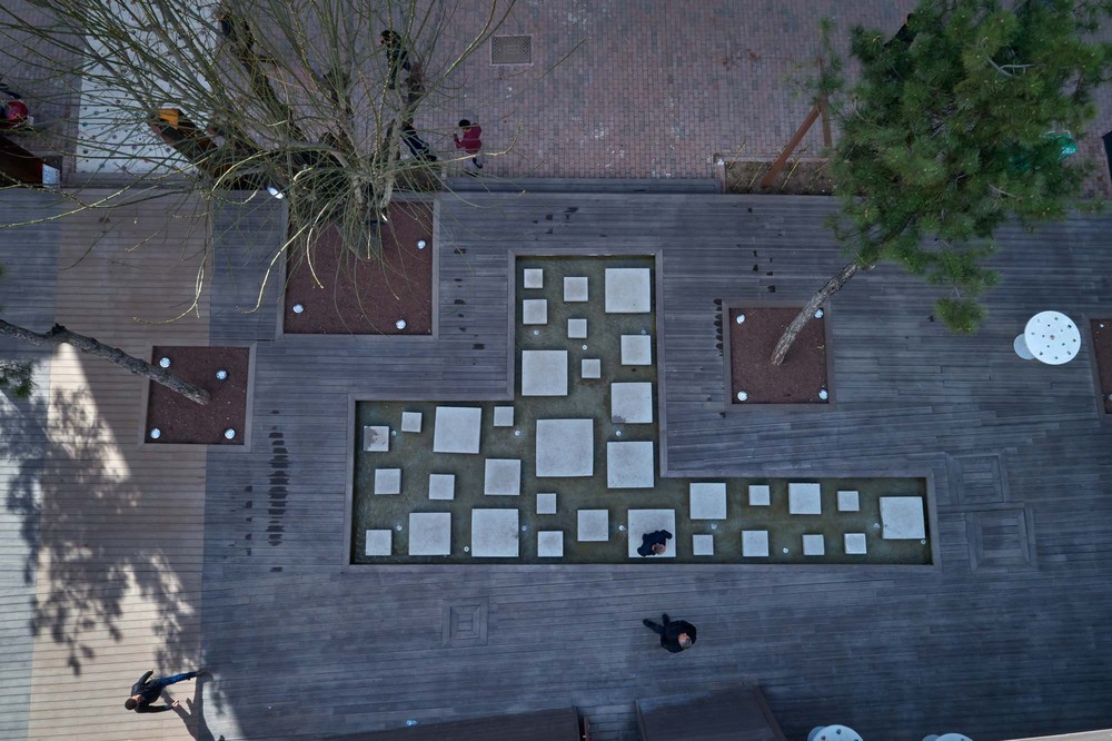 27-HAMAMYOLU URBAN DECK-stone pool shaped according to the trees.jpg
