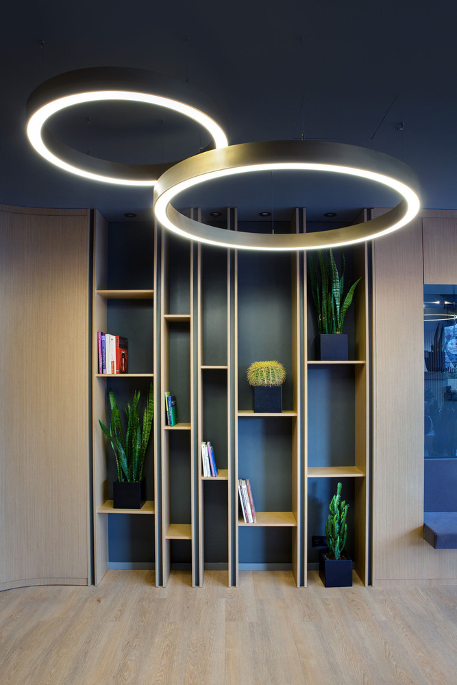 slasharchitects-bati-dental-policlinic-19-bookshelf-wood-lighting-design.jpg