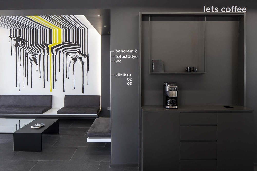 slasharchitects-dentcraft-polyclinic-06-mural-graphic-wall-zebra-kitchenette-wall-paint-furniture-design.jpg