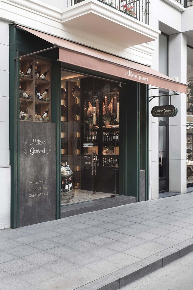 02-slasharchitects-milanogourmet- entrance-facade-awning.jpg