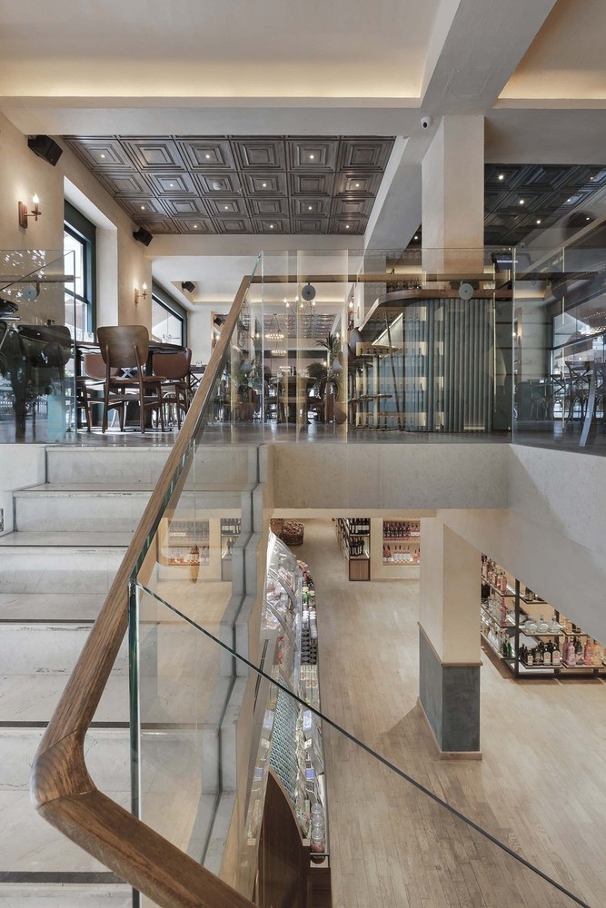 06-slasharchitects-milanogourmet- stairs-green-tones-restaurant-cafe.jpg