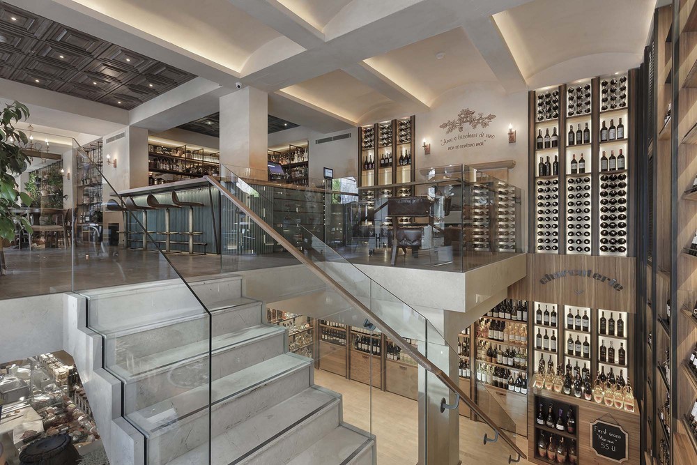 07-slasharchitects-milanogourmet- charcuterie-bar-restaurant-ceiling-warm-interior-atrium.jpg