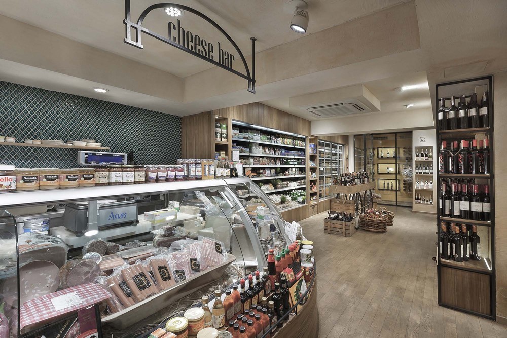 17-slasharchitects-milanogourmet- wine-shop-cafe-cheese-bar-cold-cupboard.jpg