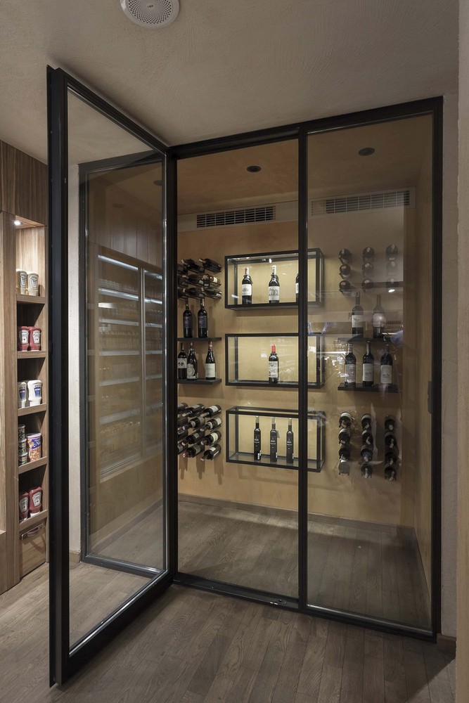 22-slasharchitects-milanogourmet-glass-wine-cabinet-kav-showroom.jpg