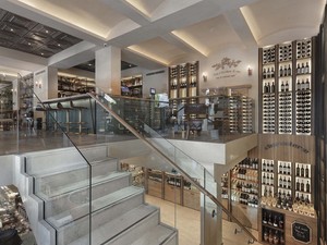 07-slasharchitects-milanogourmet- charcuterie-bar-restaurant-ceiling-warm-interior-atrium.jpg