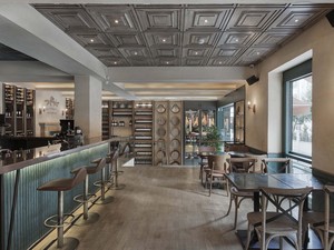 08-slasharchitects-milanogourmet- ceiling-bar-table-chair.jpg