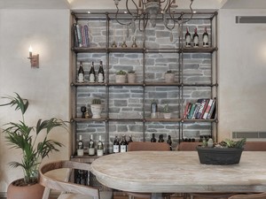 11-slasharchitects-milanogourmet- library-green-plant-chandelier.jpg